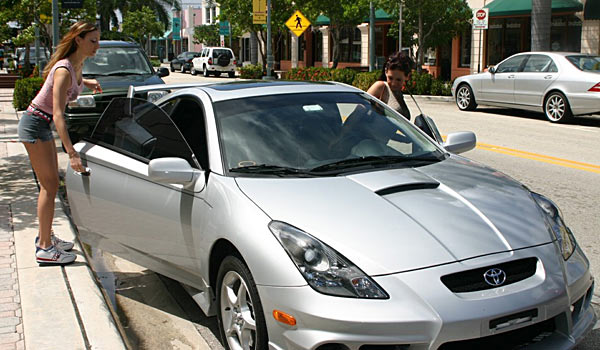 Two very sexy girls with big tits drive in a Celica 1